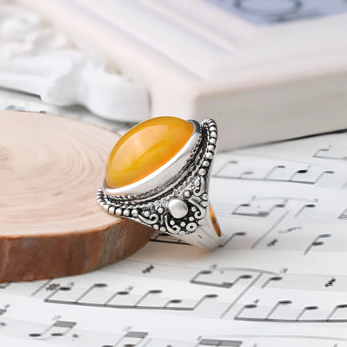 Alloy geometric retro ring with antique silver amber colour and fluorescent beeswax detailing