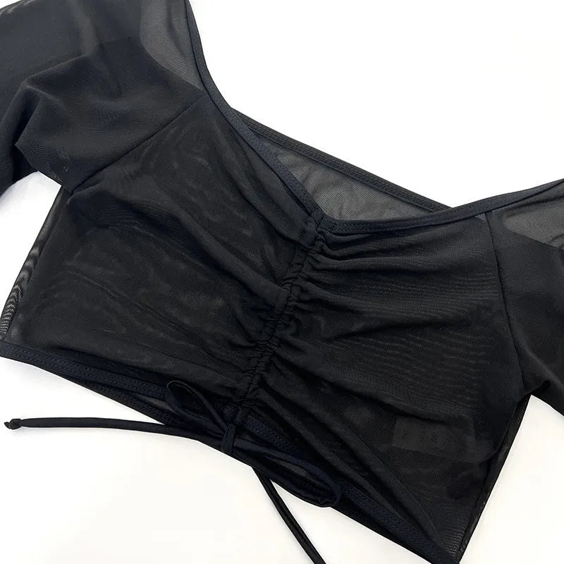 Women's black mesh four-piece swimsuit bikini set with long sleeves