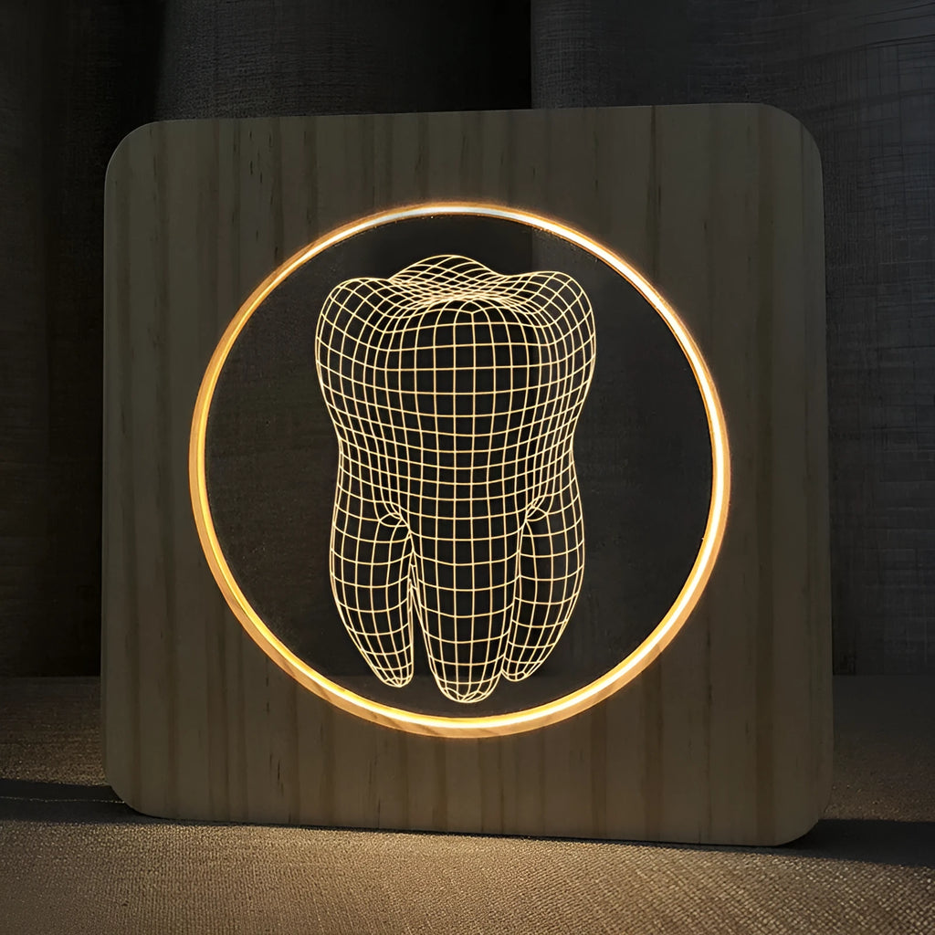 Wood colour tooth-shaped acrylic night light on a surface with a USB cable.