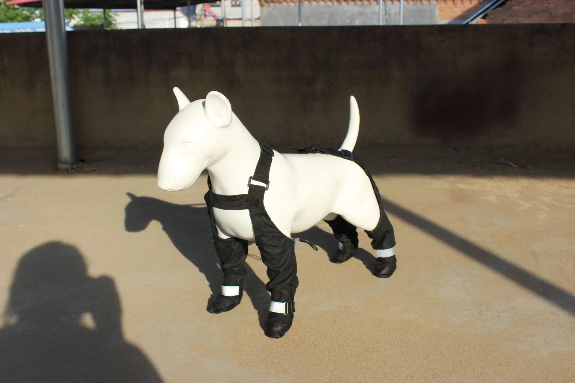 Black waterproof dog shoes with adjustable straps for paw protection