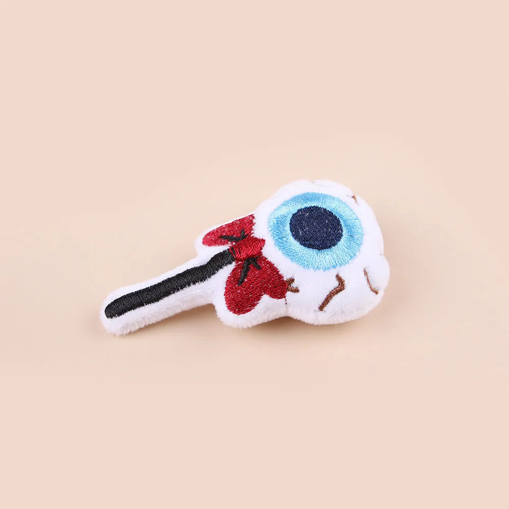 Small cat teaser wand toy with plush candy-themed attachment for interactive pet play