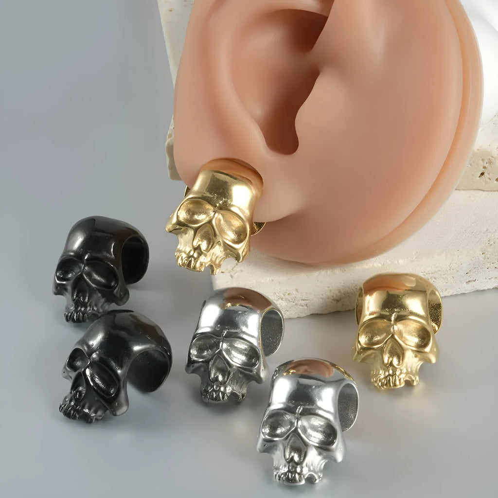 Hollow skull Buddha stainless steel earrings with geometric hip hop styling in auricle piercing design