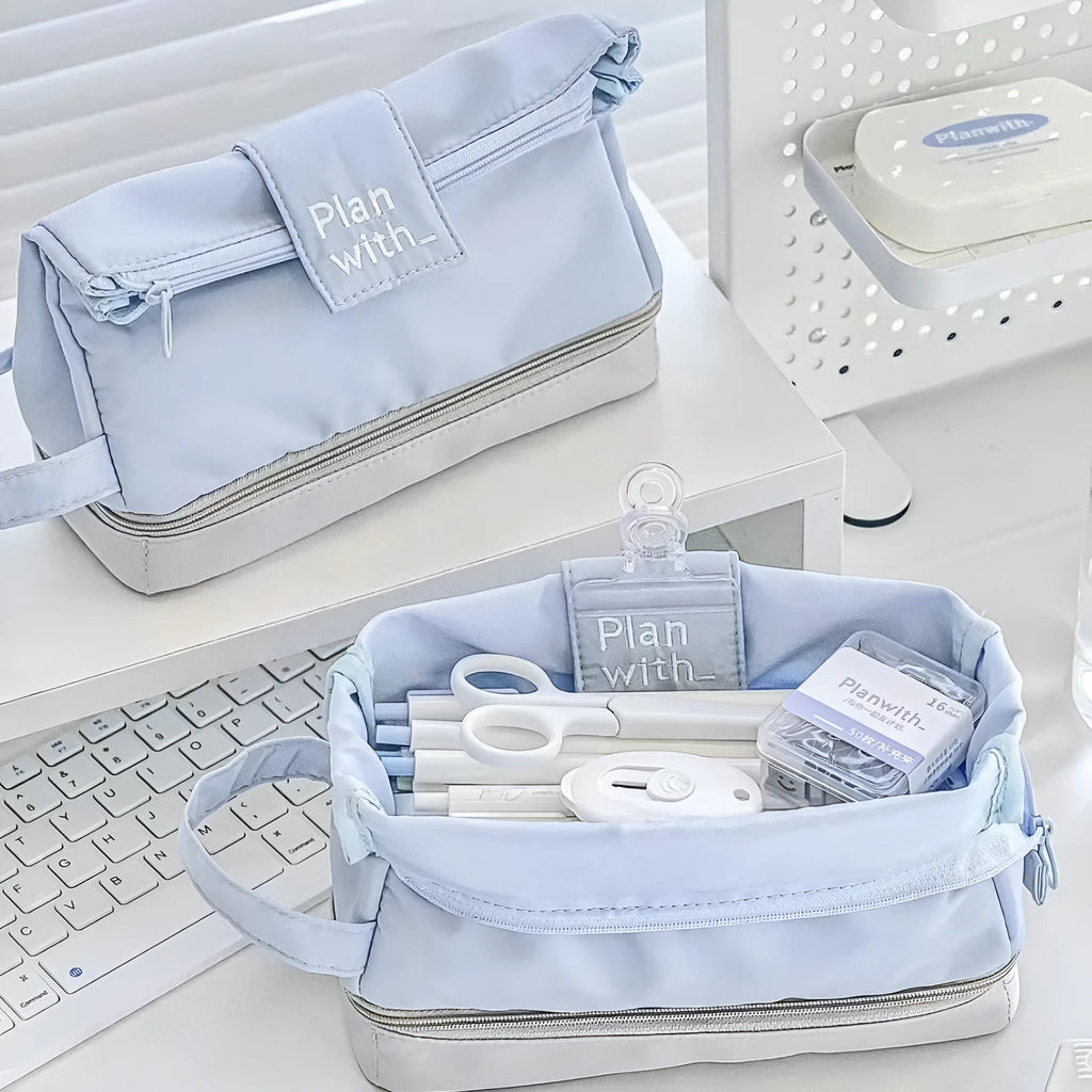 Polyester folding double-layer pencil case in dark blue, blue, and cream white colour options.