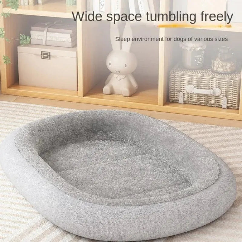 A thickened grey dog kennel for a small dog, shown alongside green and pink colour options.