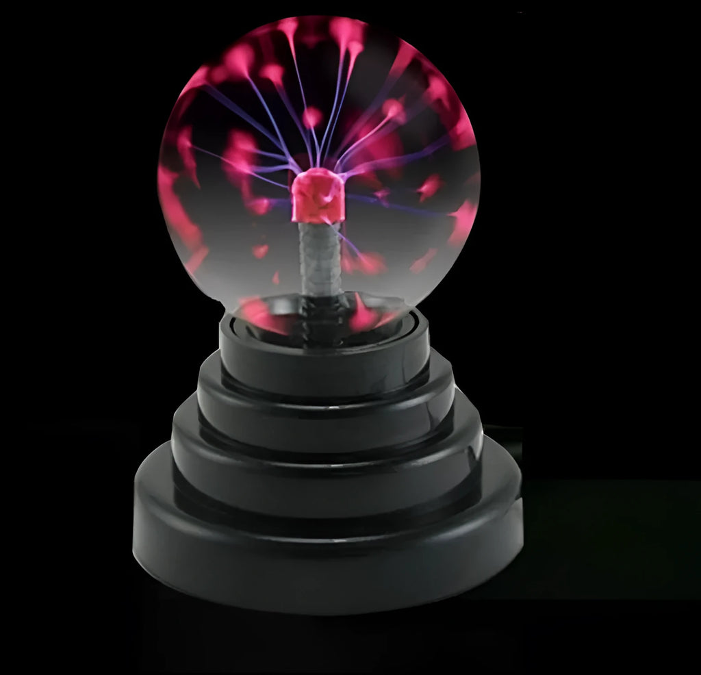 Magic light ball with colourful changing effects in 7.62cm glass sphere on ABS base