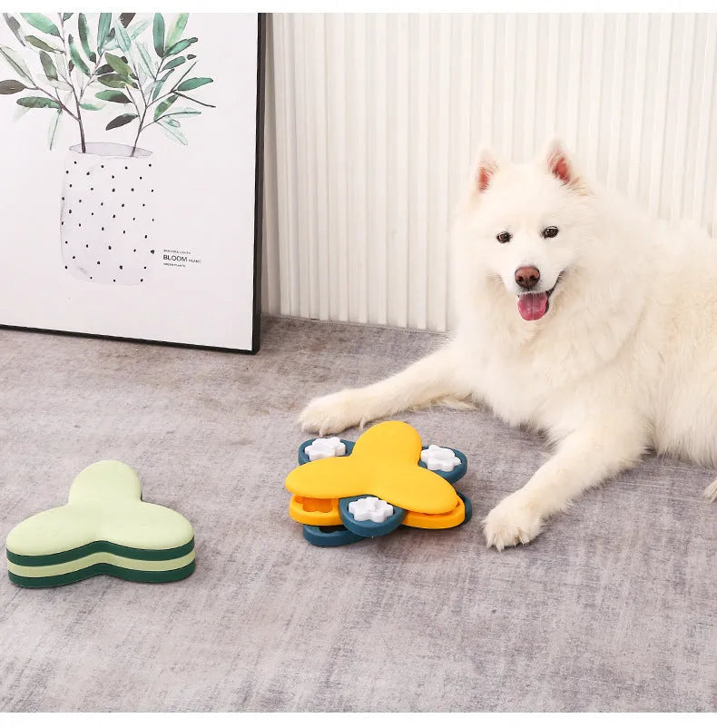Green and yellow interactive dog puzzle toy with rotatable compartments and bone-shaped covers