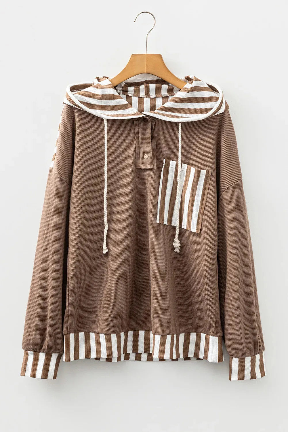 Straw yellow women's hoodie with waffle texture, striped patchwork, button neck, and drawstring waist.