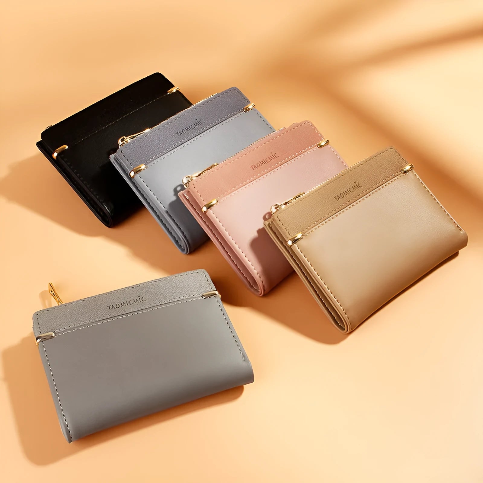Short zipper ladies wallet in PU leather showing internal card slots, bill holder and change compartment.