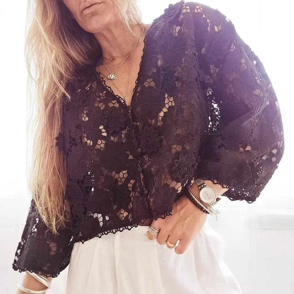 Black lace cardigan shirt with 3D floral embroidery and a V-neck, shown on a hanger.