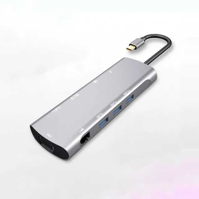 Grey aluminium USB-C docking station with HDMI, VGA, and USB ports
