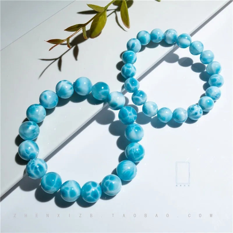 Handmade blue sea-pattern natural crystal Bodhi bracelet with pearl accents on wrist