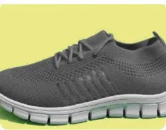 Breathable ladies flat shoes in mesh with round toe and front tie closure