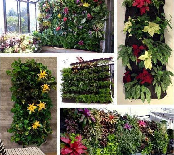 Green felt vertical wall planter with multiple planting pockets hung on an outdoor fence