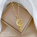 Geometric moon pendant necklace with diamond accents and tassel on stainless steel chain