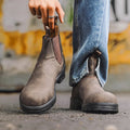 Vintage unisex Chelsea boots in frosted PU leather with beef tendon sole, showing round toe and car suture detail