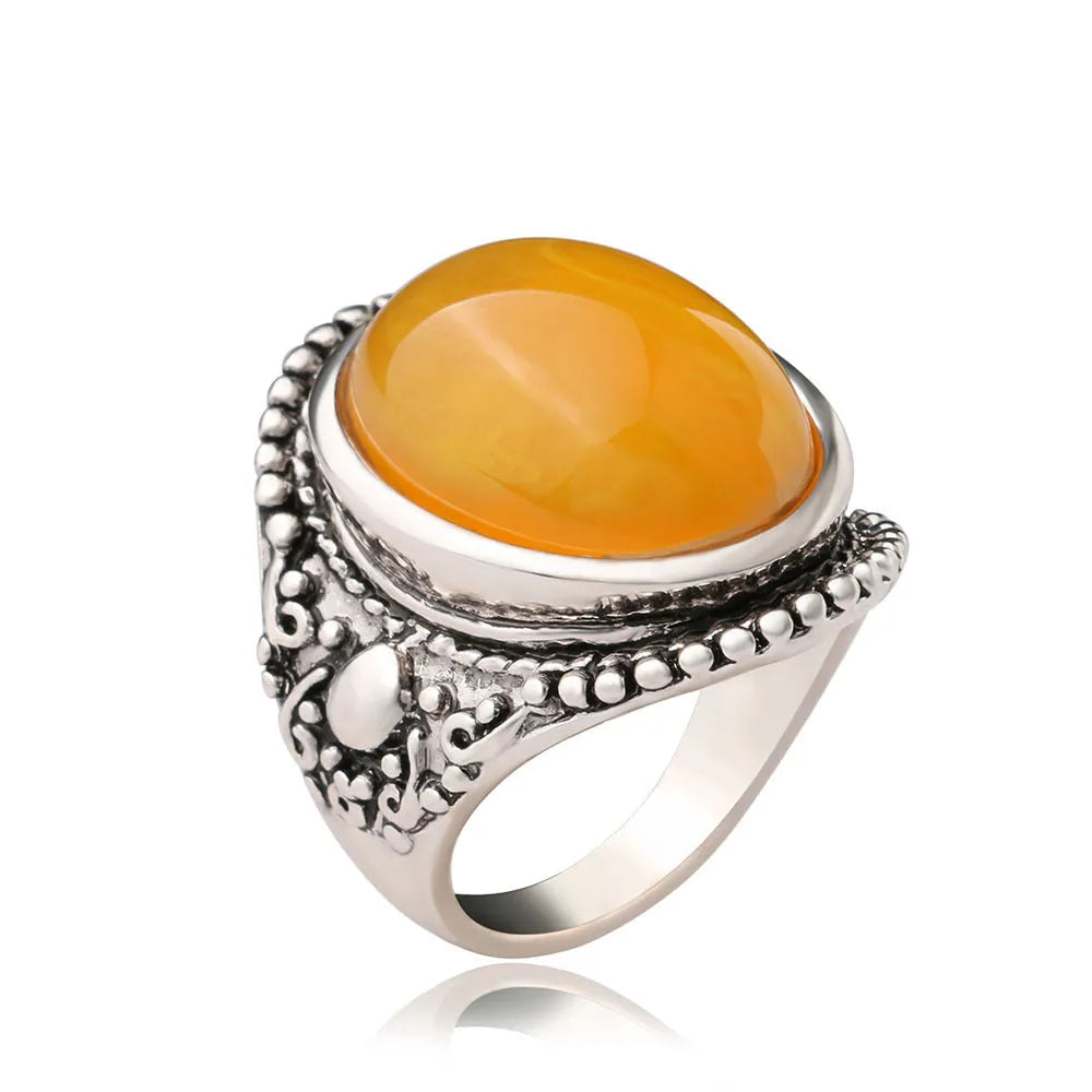 Alloy geometric retro ring with antique silver amber colour and fluorescent beeswax detailing