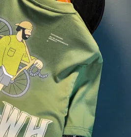 Green men's T-shirt with literary youth printed design showing loose fit short sleeves