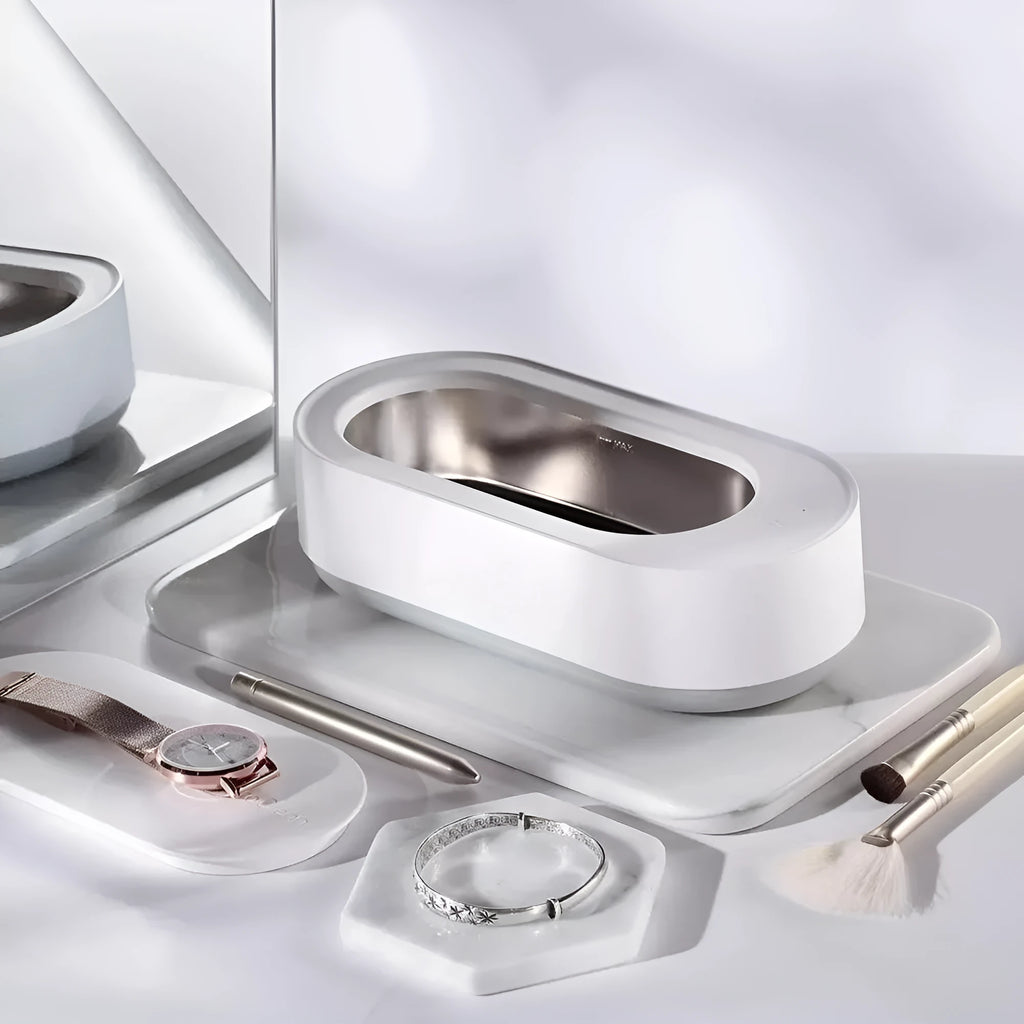 White portable ultrasonic cleaning machine with digital display and stainless steel tank.