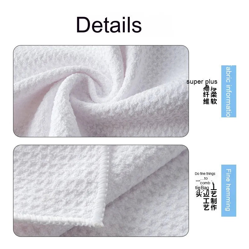 Waffle weave golf ball cleaning cloth in selected colour on a green.