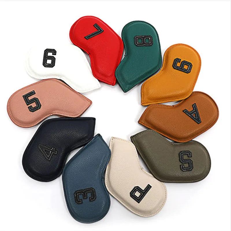 Set of 10 printed PU golf club head covers in assorted digital patterns.