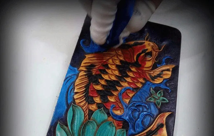 Men's hand-carved cow leather short wallet in blue red or gold colours showing bi-fold design