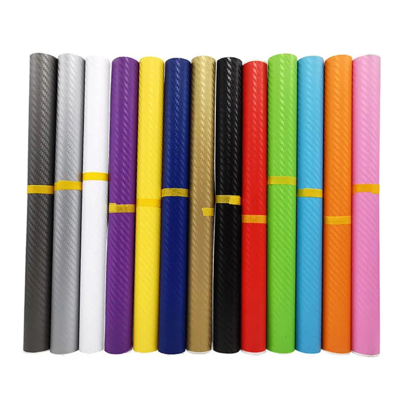 Roll of black 3D carbon fibre texture adhesive sticker for car decoration, showing textured pattern.