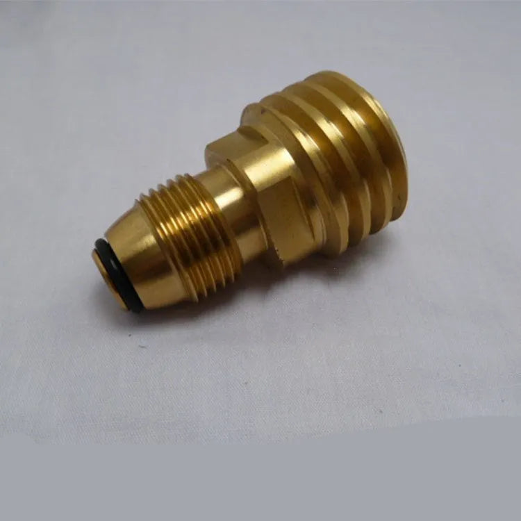 Gold-coloured brass gas brazier adapter with visible taper threads for 7 mm connections.