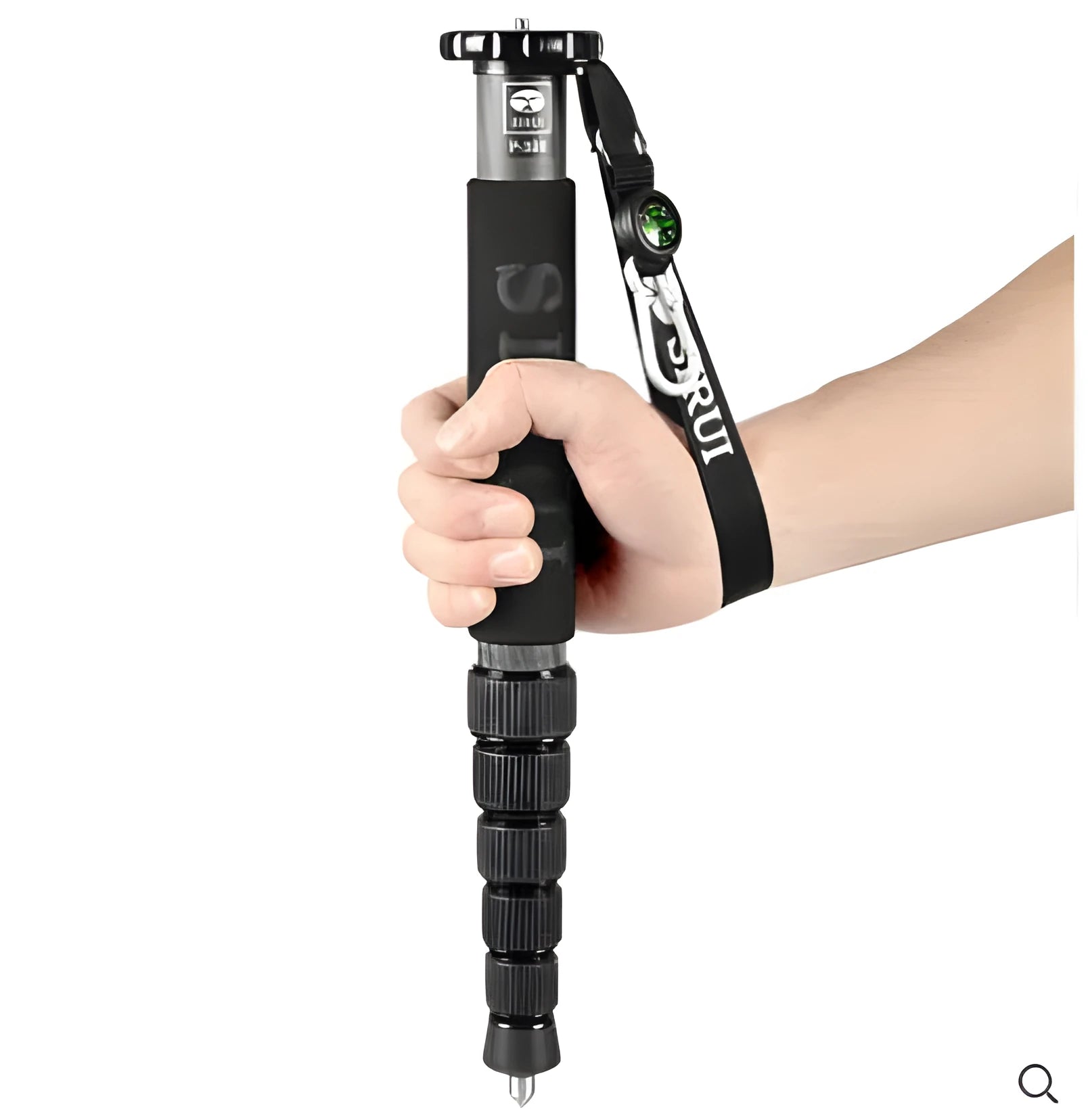 Black carbon fibre SLR camera monopod with 6 telescoping sections shown at extended height