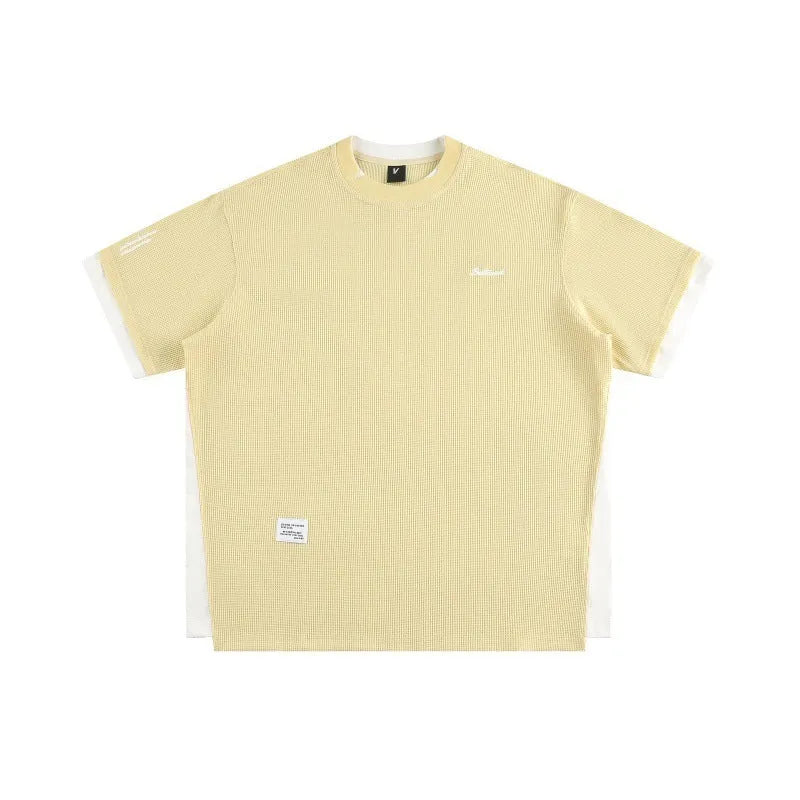 Retro alphabet embroidered waffle t-shirt in loose pullover style with short sleeves
