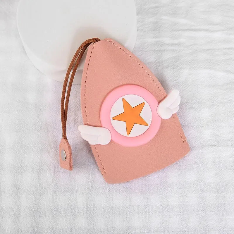 Colourful cartoon pull-out key case made from PU leather, showing the key extended from its protective sleeve.