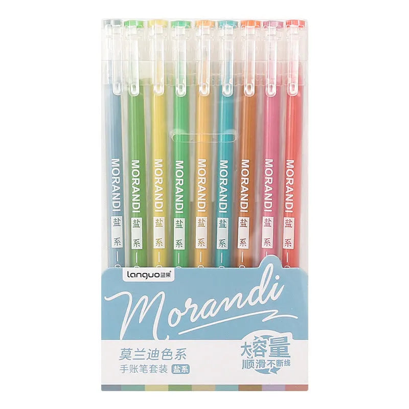 Set of nine retro style gel pens with 0.5mm needle tips in plastic casings on a notebook