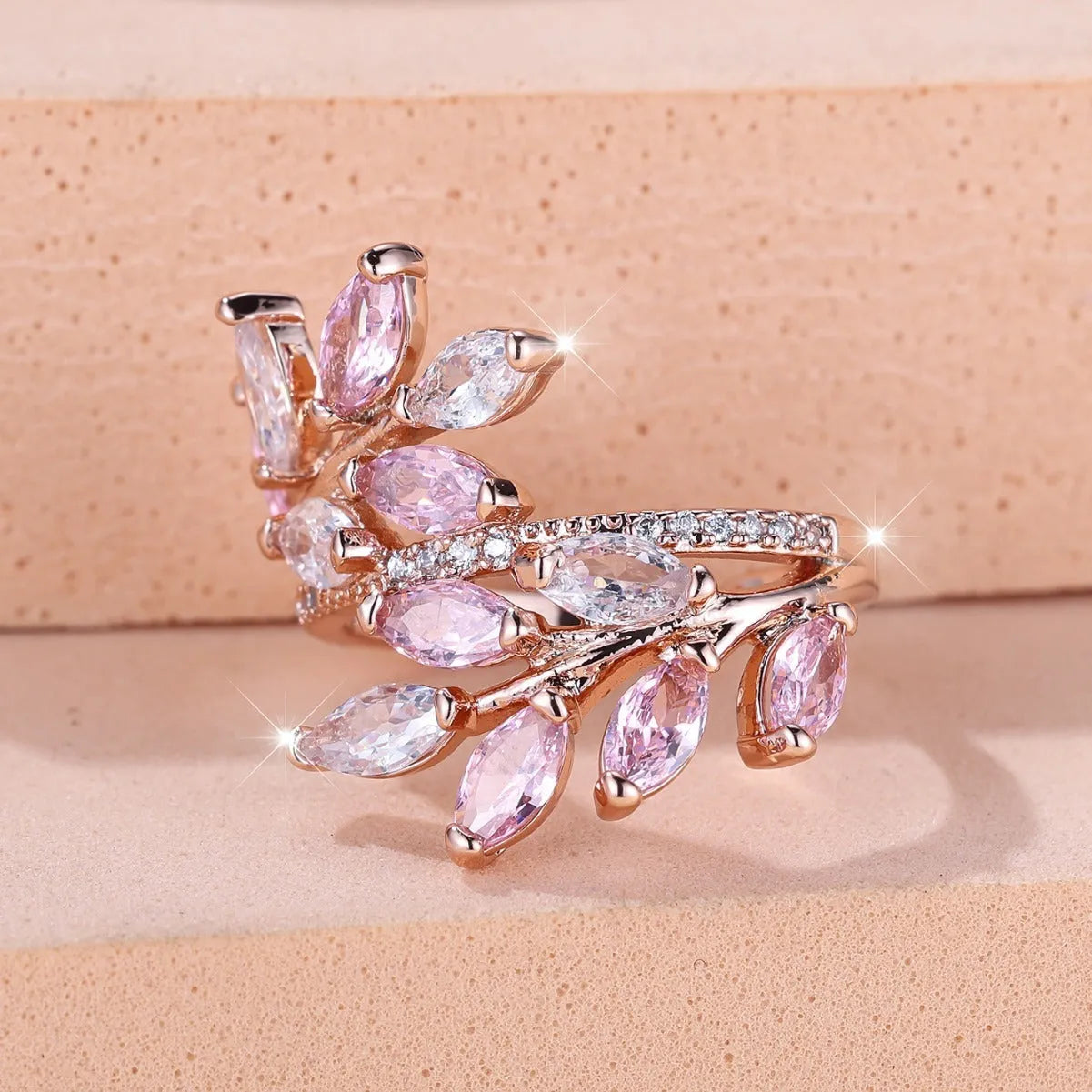 Adjustable copper leaf ring with zircon accents in multiple colour finishes including platinum white and rose gold