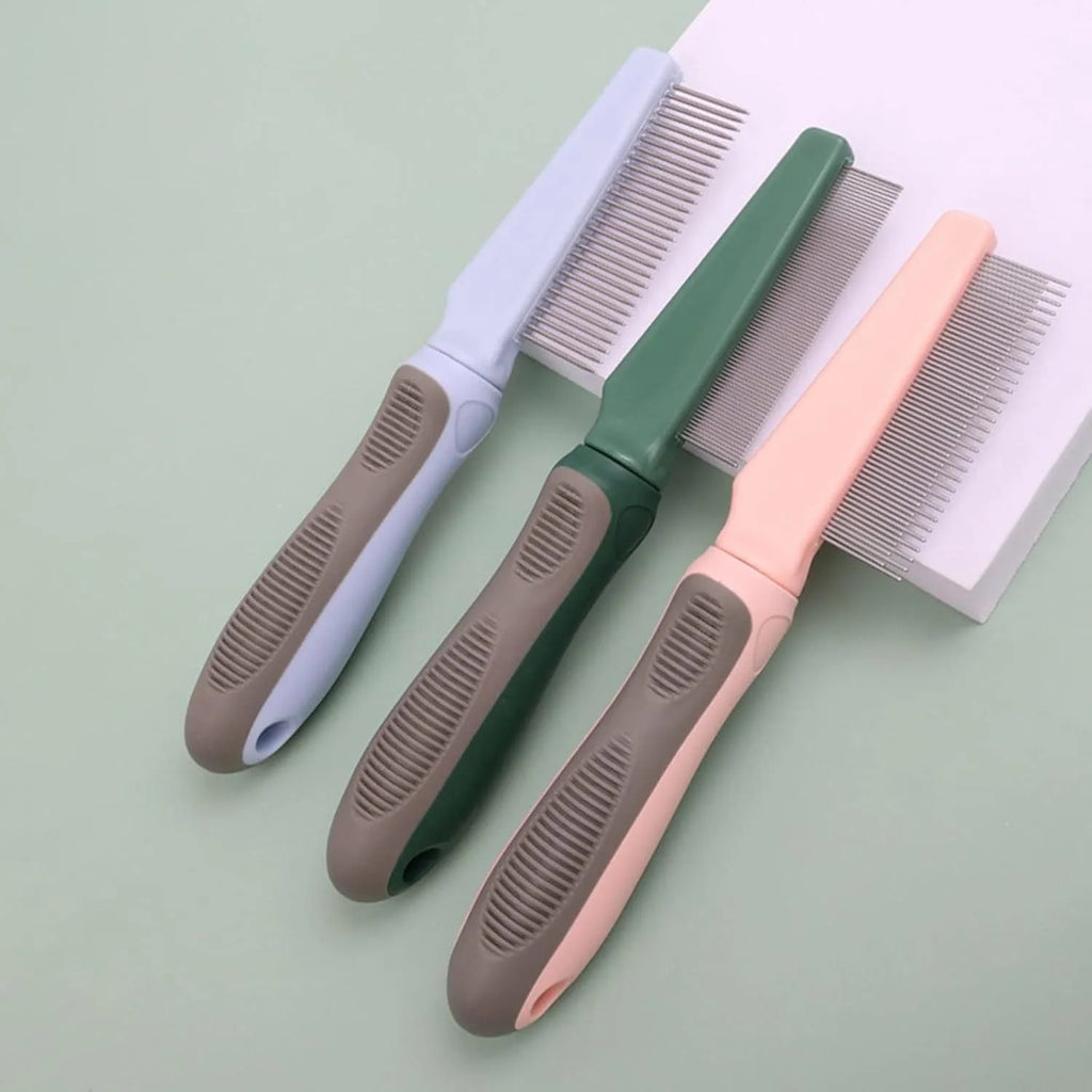 Blue pet detangler comb showing three different tooth patterns and rubber handle