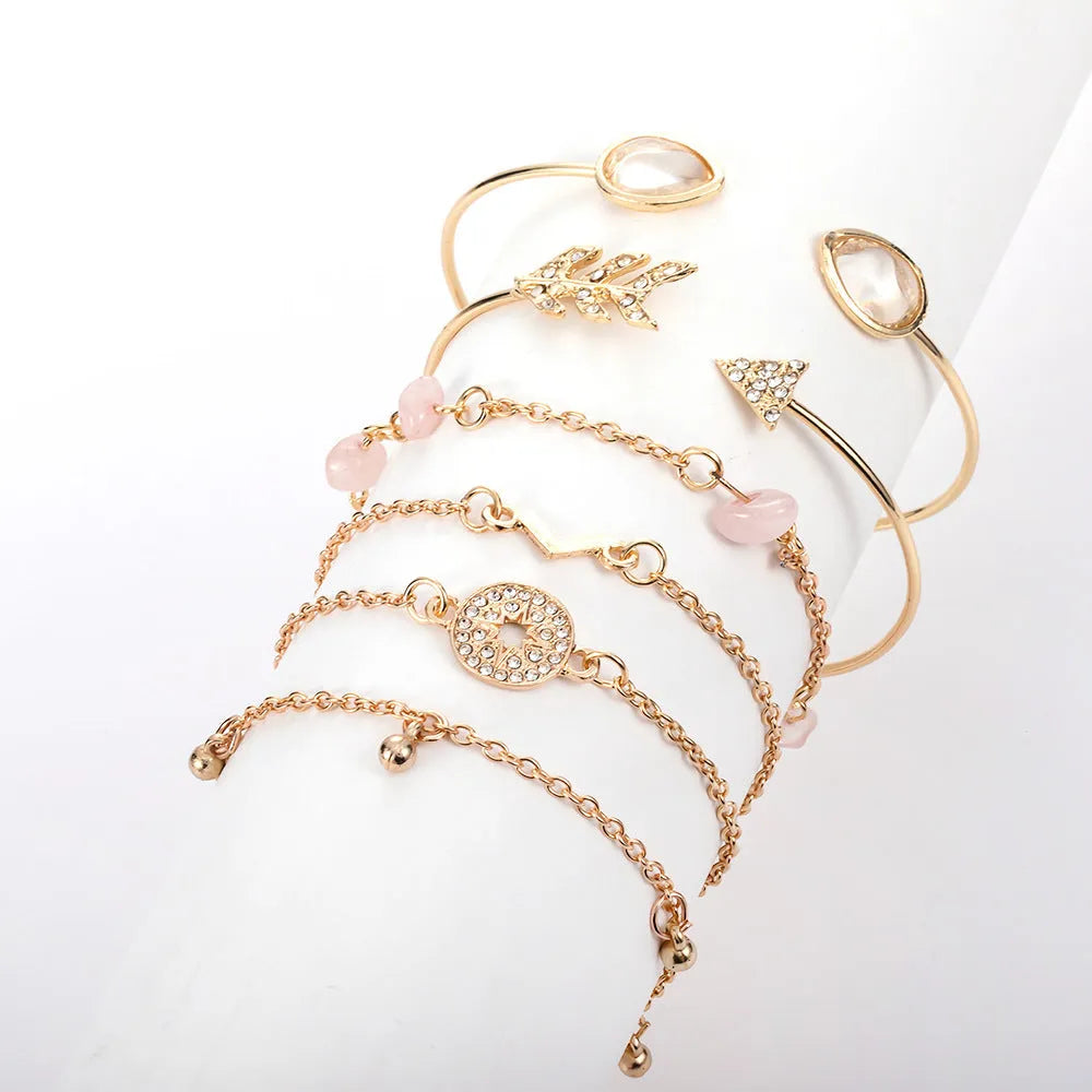 Gold zinc alloy bracelet set with water drop and arrow charms