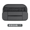 Black leather car seat rear storage bag measuring 36x24x8cm hanging on a vehicle seat back