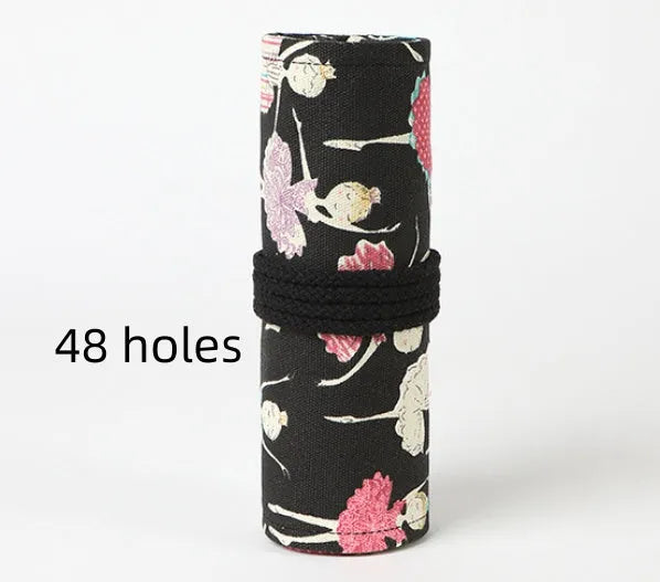 Canvas rolling pencil case with ballet girl print, showing multiple holes for pencils in a rolled-open state.