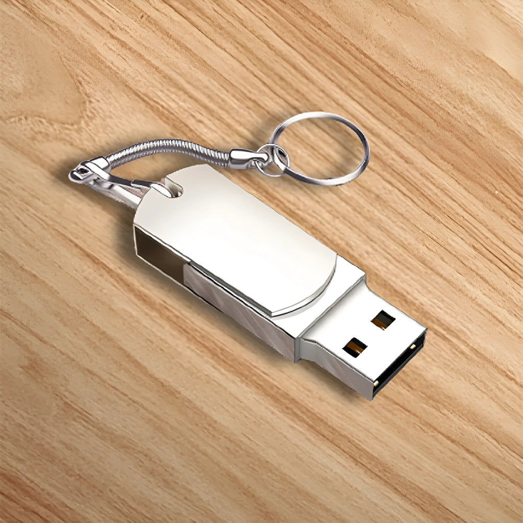 White metal USB flash drive with rotating casing showing compact size
