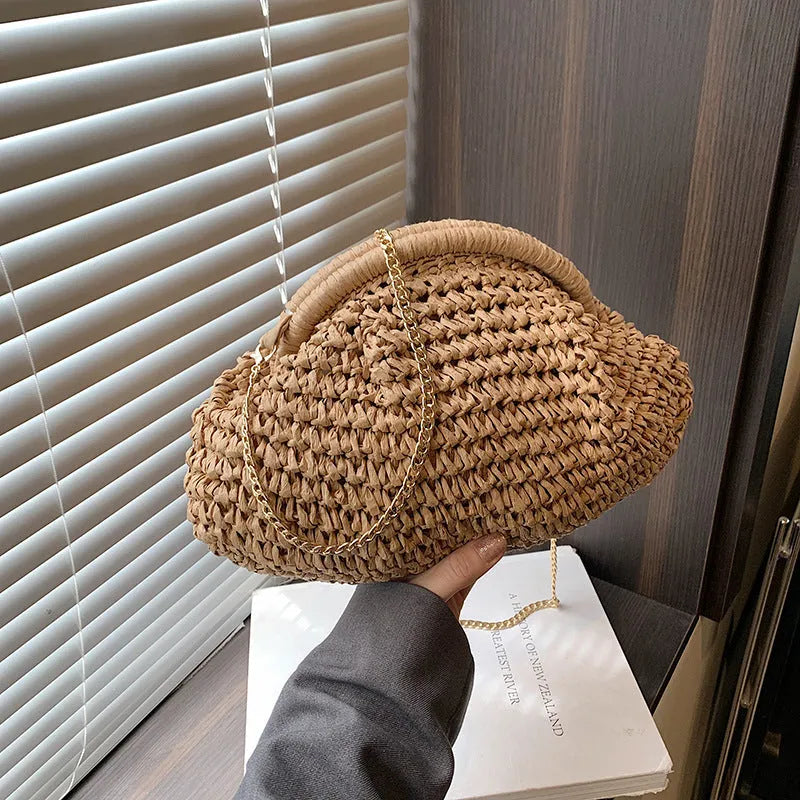 Khaki paper straw shoulder bag for women with shell shape, chain detail, and polyester lining for beach and daily use