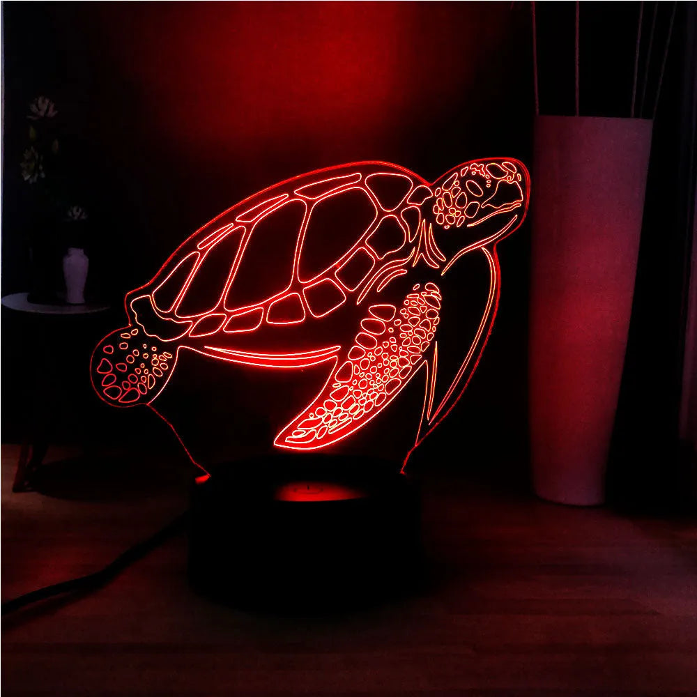 3D acrylic LED turtle night light showing colour-changing glow and remote control