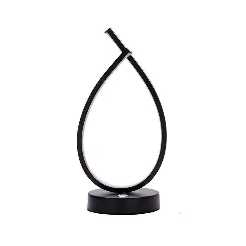 Black and white USB touch control table lamp with water drop shape measuring 30cm tall