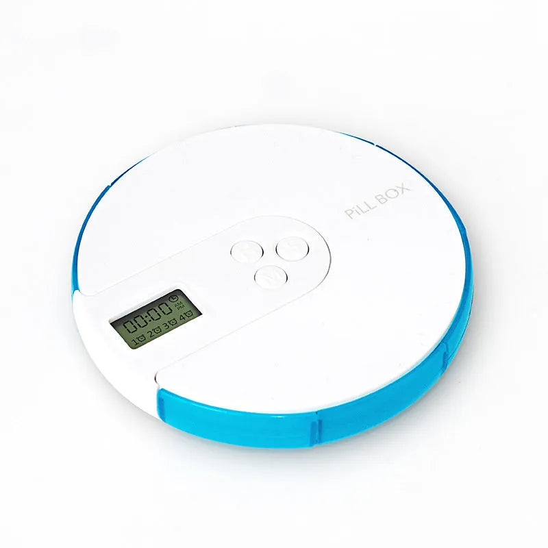 Blue 7-compartment alarm clock pill dispenser showing time display and medication slots