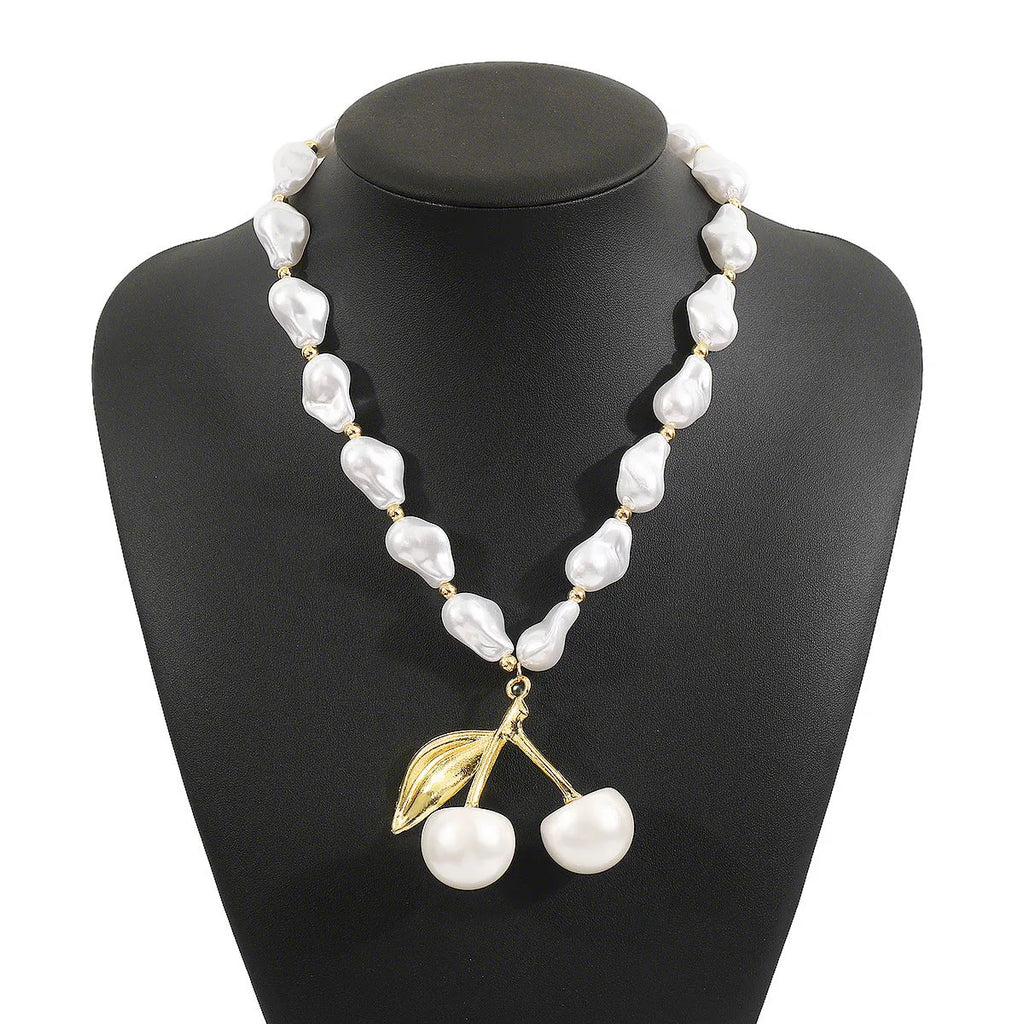Adjustable women's necklace with cherry fruit pendant and pearl-style chain in gold or white K