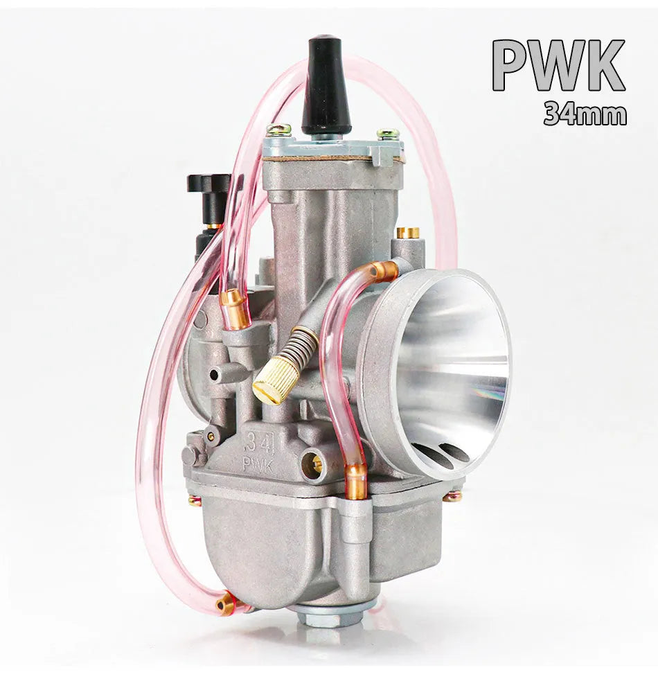 Seven sandblasted PWK motorcycle carburettors in sizes 21mm, 24mm, 26mm, 28mm, 30mm, 32mm, and 34mm.