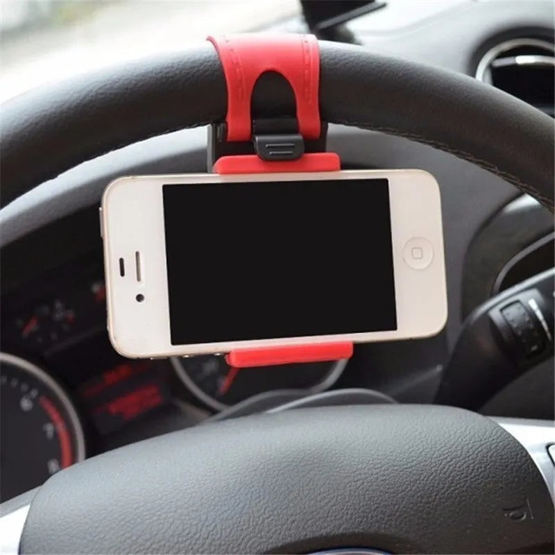 Black steering wheel phone clip mount holder showing adjustable clip and phone placement