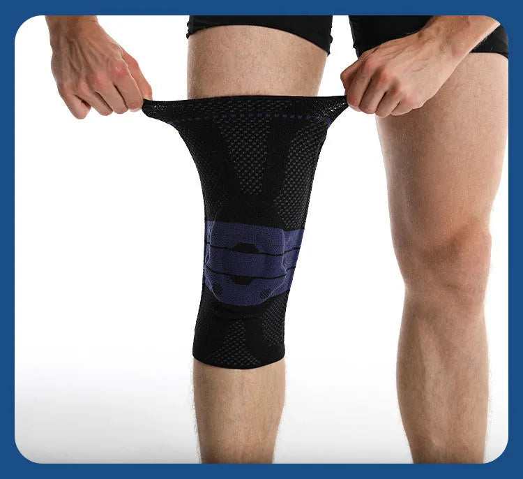 Black and blue adult sports knee pad made from nylon and spandex, shown on a knee.