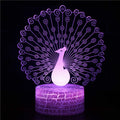 Acrylic USB touch table lamp with 3D small night design on a small black ABS base.