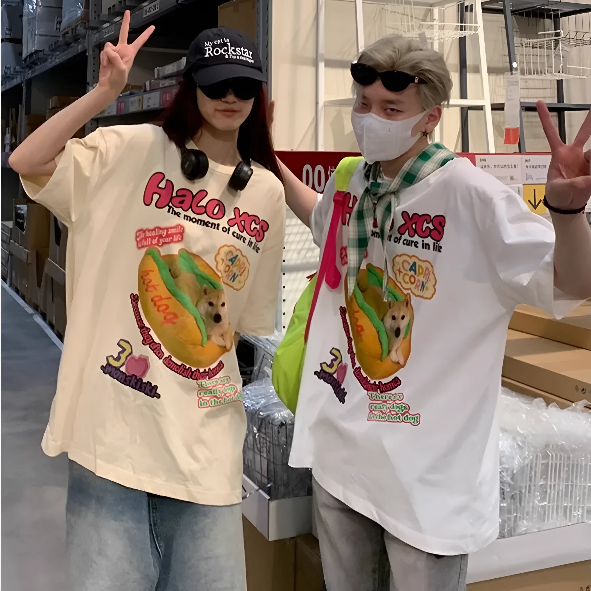 White loose-fit cotton t-shirt featuring a colourful cartoon print of a hamburger and a dog.