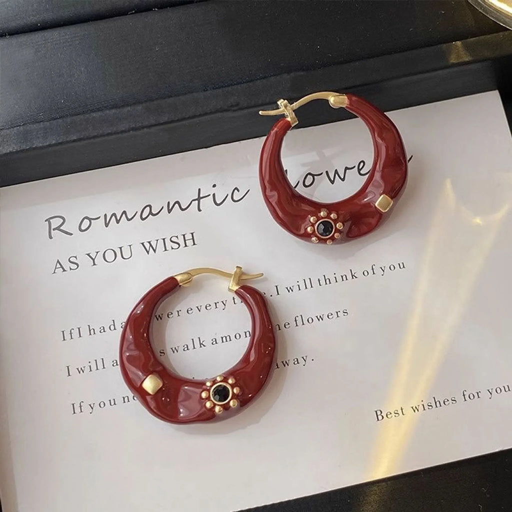 Hong Kong style black and red alloy ear studs with rhinestone decoration and dripping oil treatment