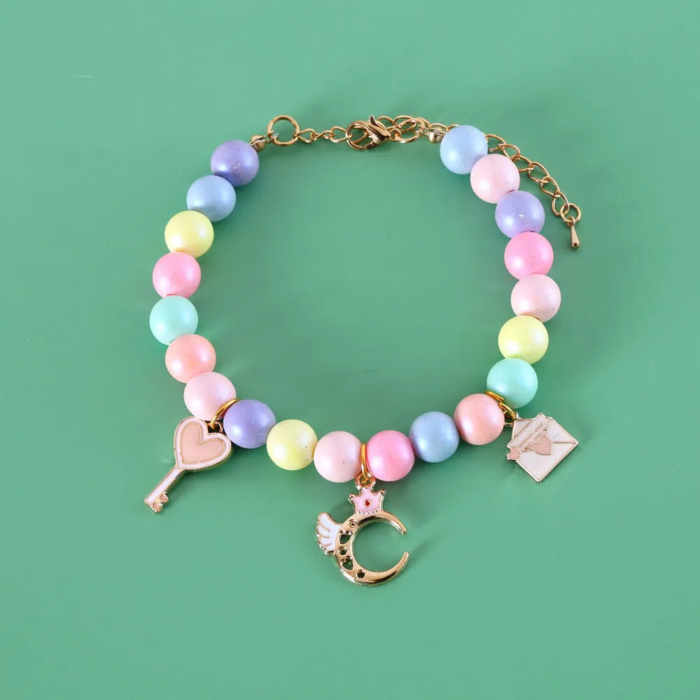 Macaron-coloured pet accessory set with resin headdress, collar, necklace and bracelet for photography