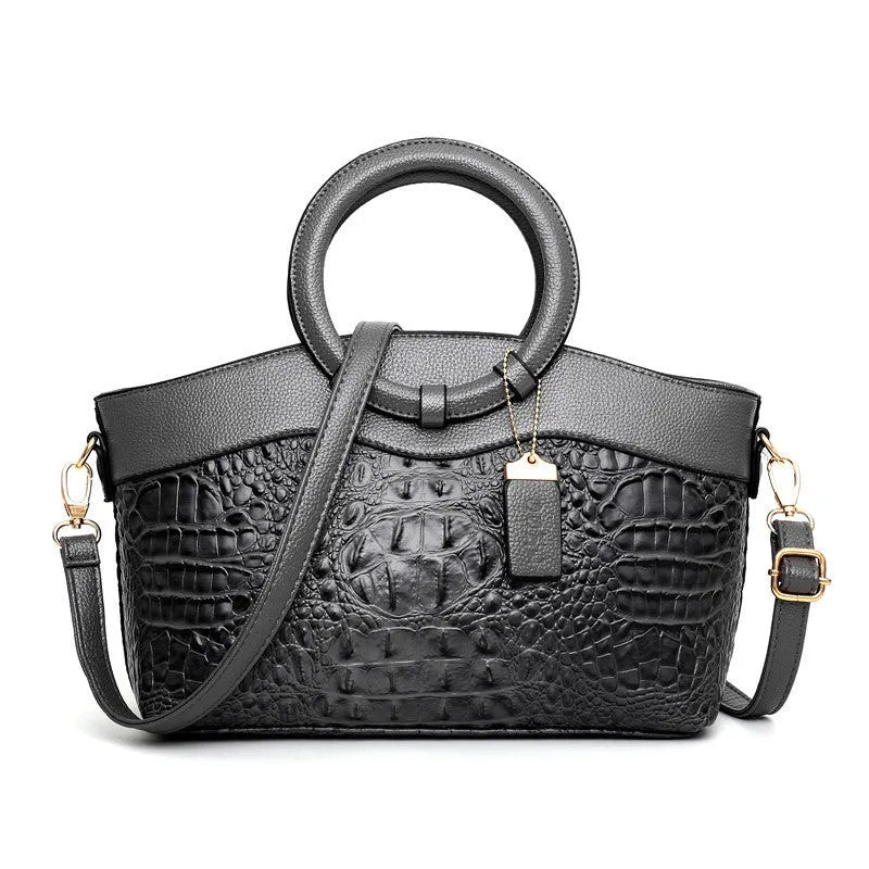 Fabric ladies' casual handbag showing multiple compartments including phone and ID pockets